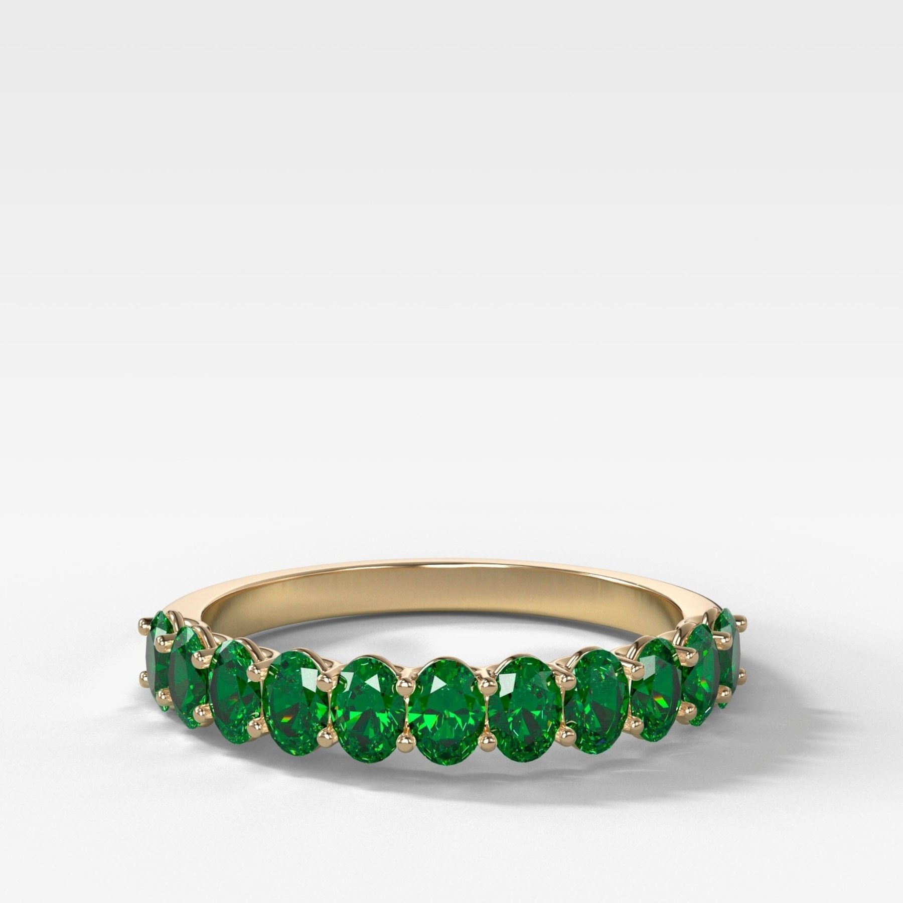 Petite Shared Prong Wedding Band with Green Emerald Oval Gemstones Main image