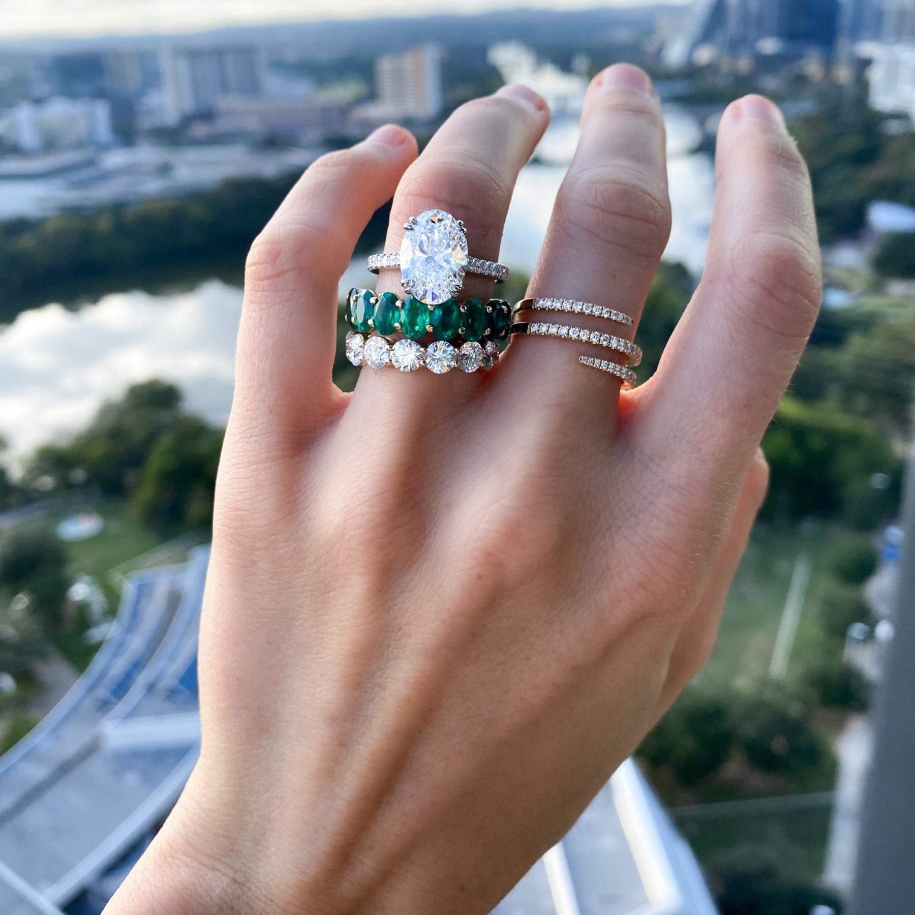 Petite Shared Prong Wedding Band with Green Emerald Oval Gemstones Secondary image