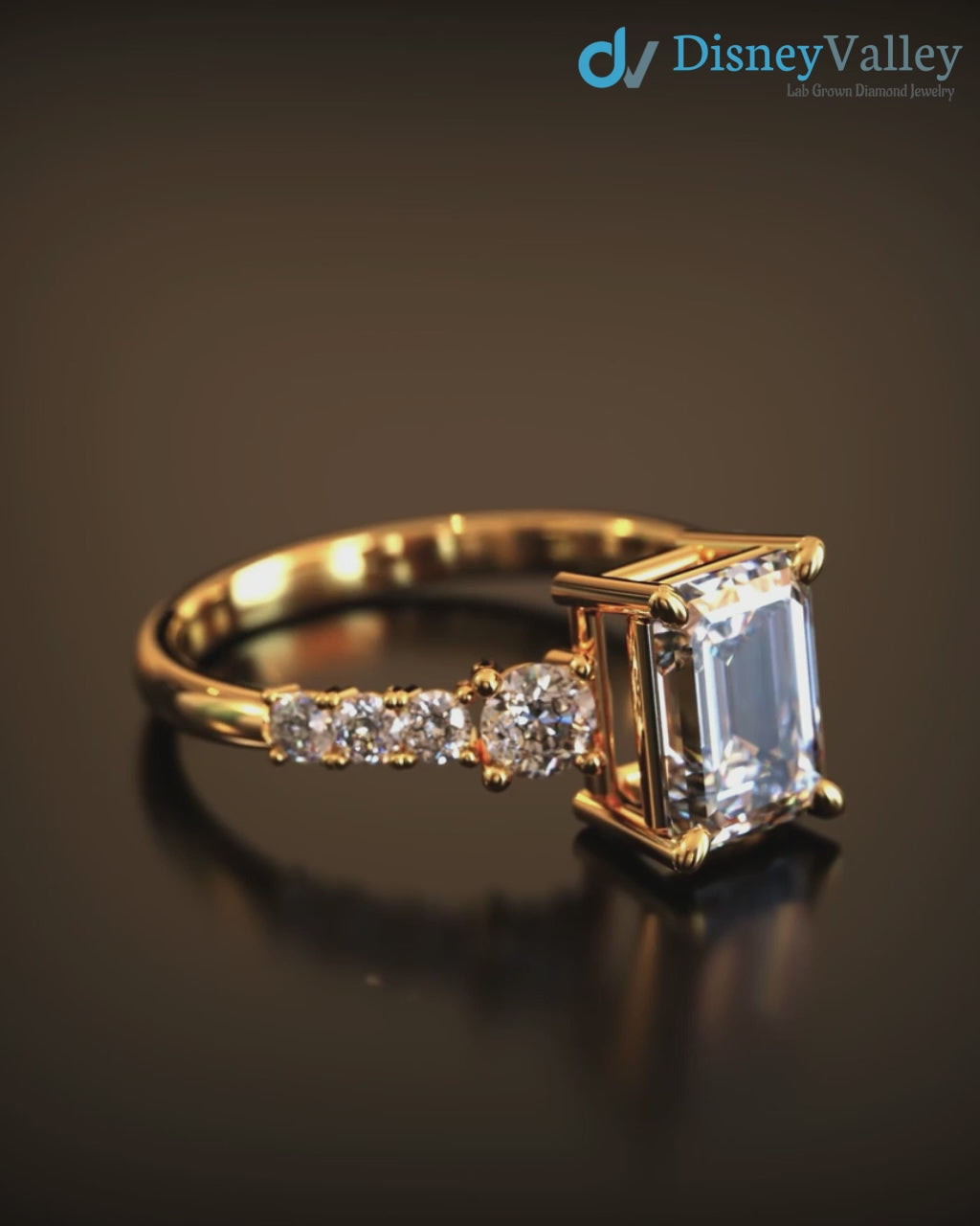 Excellent emerald cut 2 caret lab grown diamond side stone engagement ring