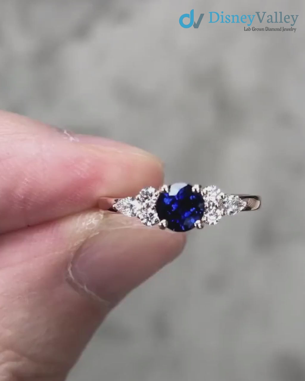 Unique Blue Sapphire and Pear Diamond Engagement Ring