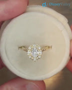 Antique Style Halo Featuring an Oval Cut Moissanite Vintage Leaves Rings