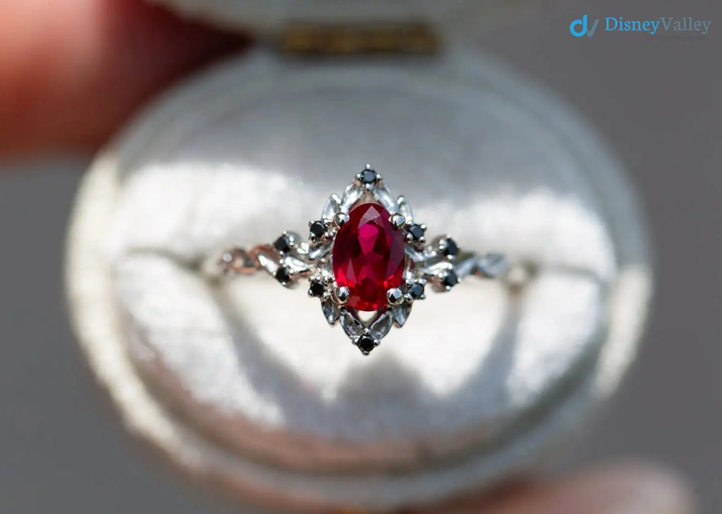 rose halo with oval lab grown ruby and black diamonds wedding ring DisneyValley