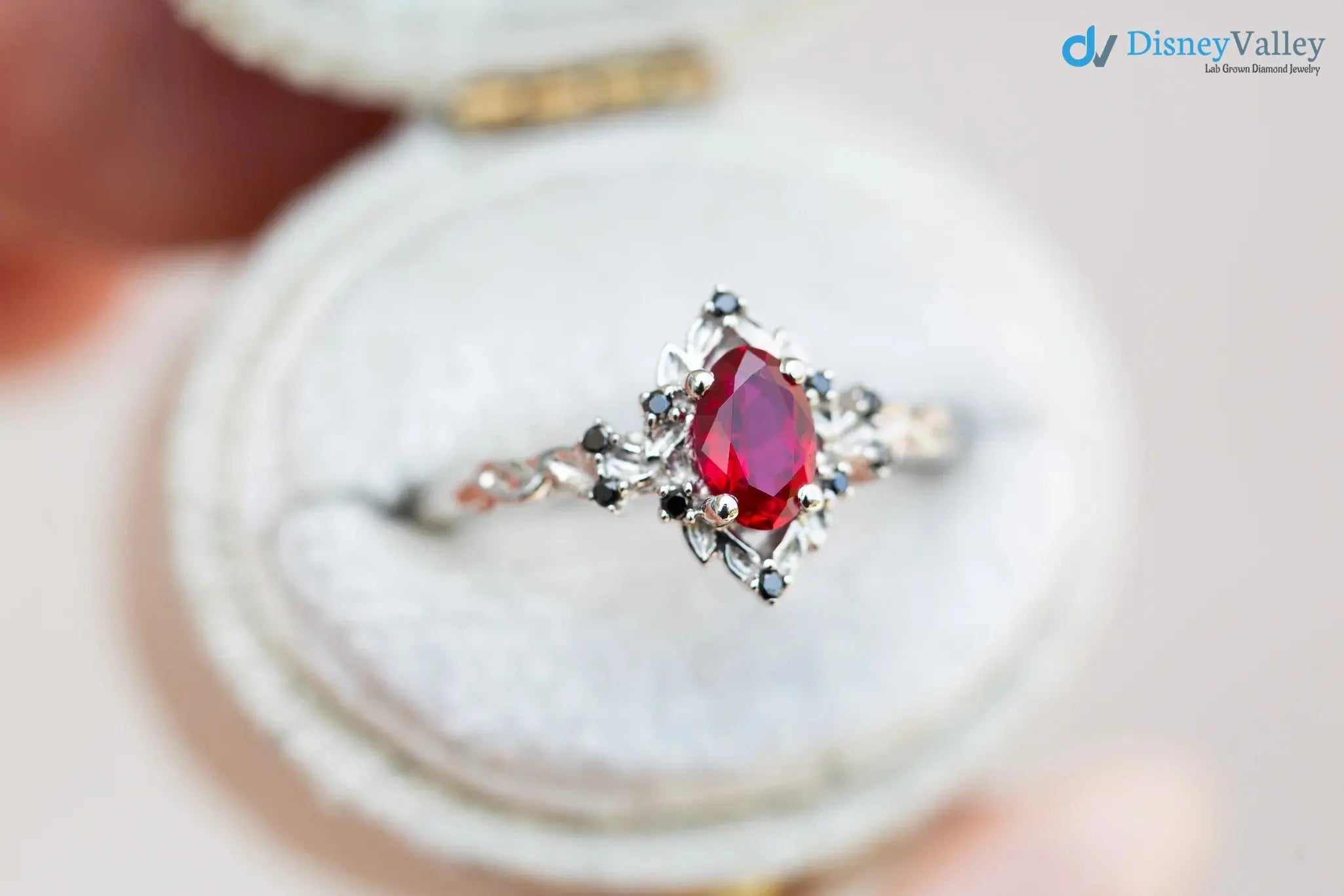 rose halo with oval lab grown ruby and black diamonds wedding ring DisneyValley