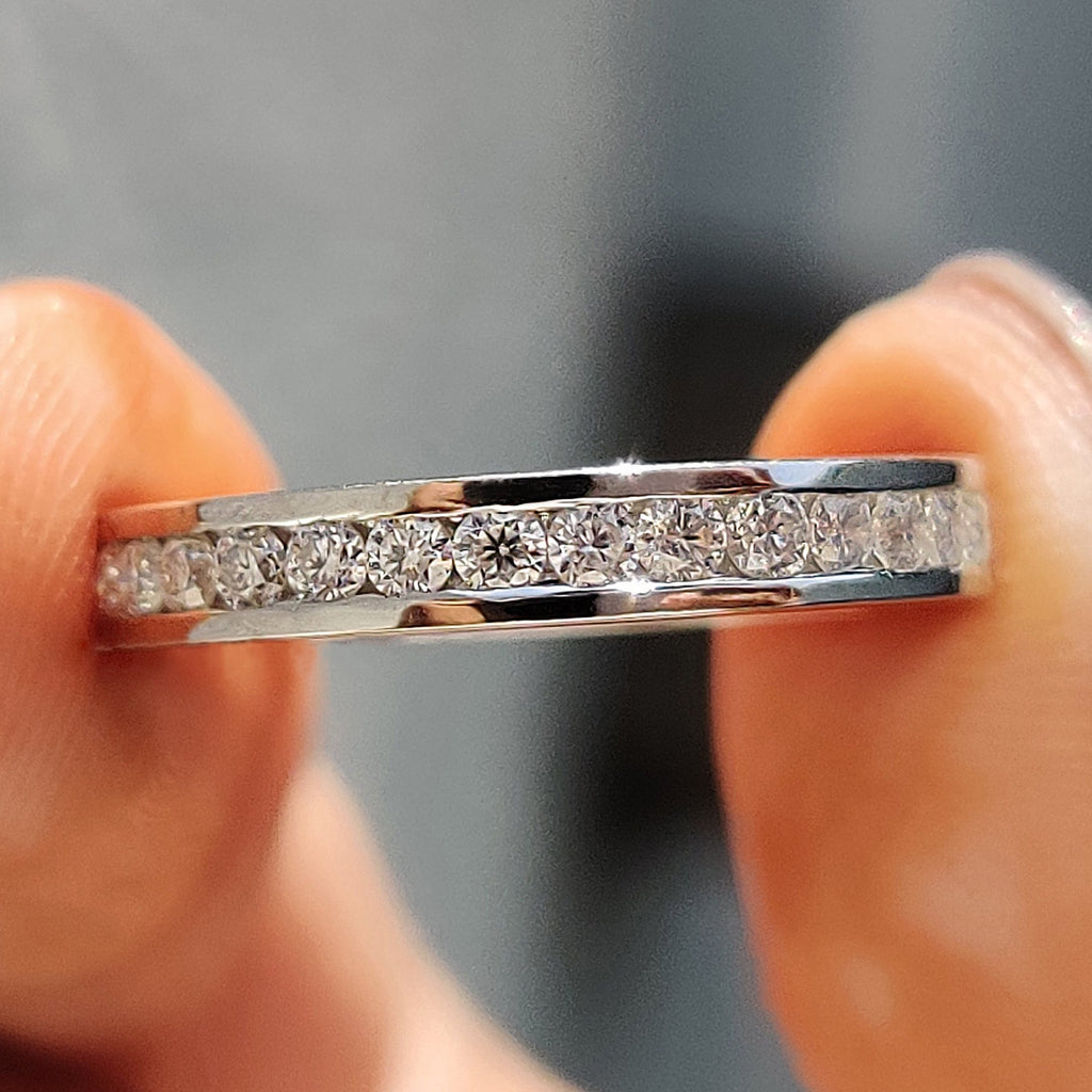 Round Moissanite Channel Set Wedding Band