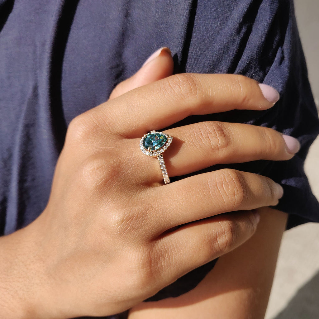 Cyan Blue Pear Cut Engagement Ring In Halo Style