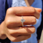 Pear Shaped Engagement Ring in Round Cut Pave Band