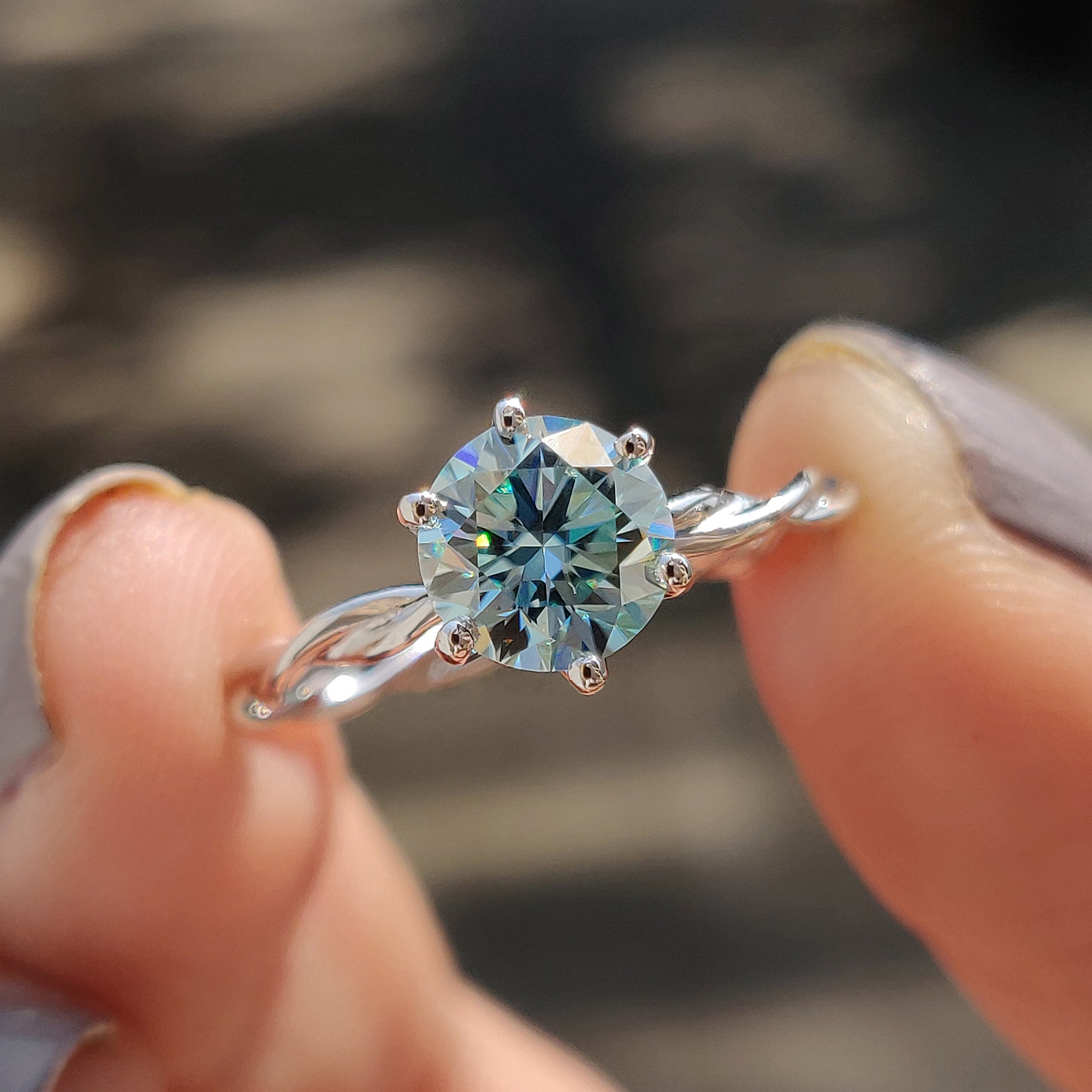 Round Solitaire Engagement Ring With Twisted Setting Main image