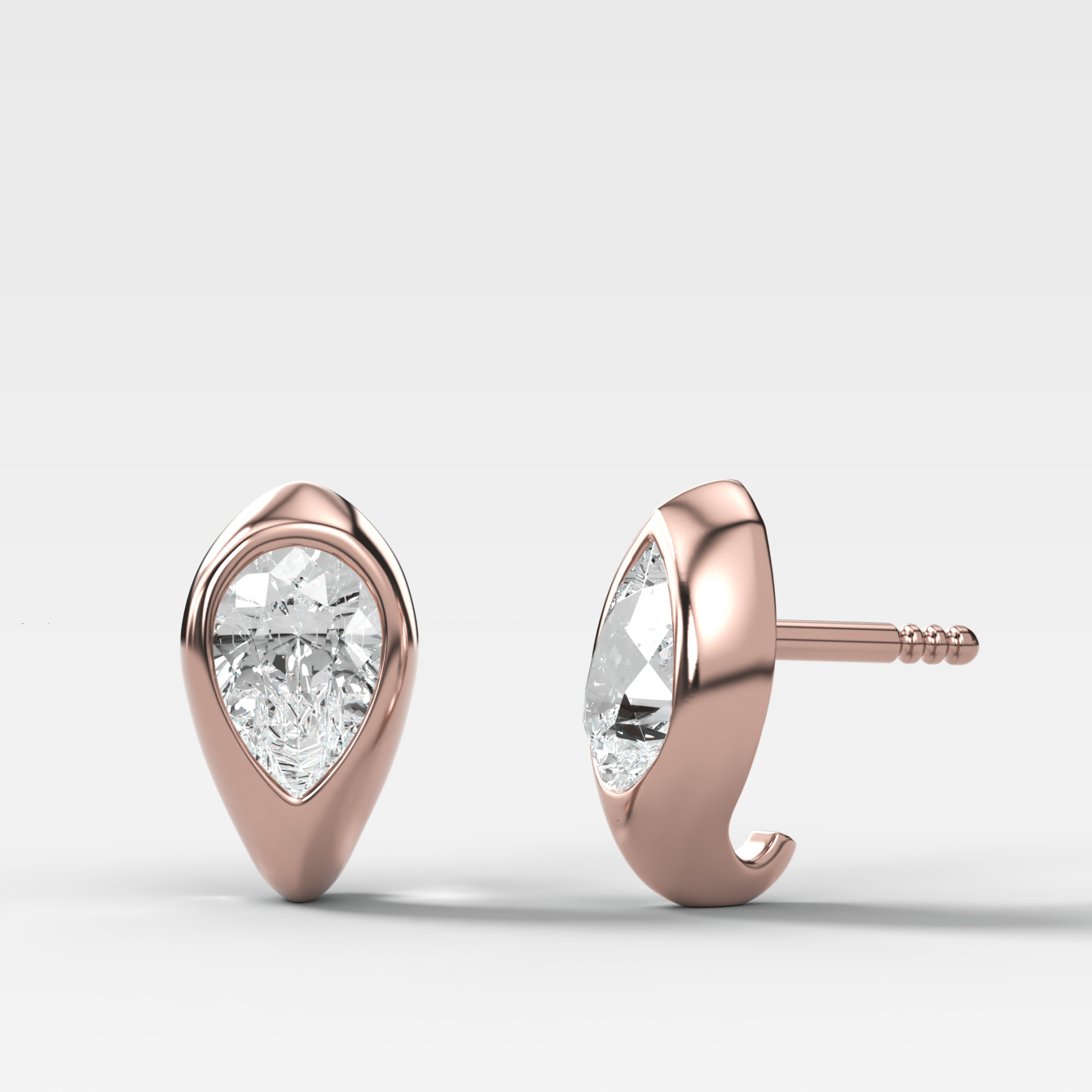 Sculpted Bezel Studs with Pear Cut Diamonds