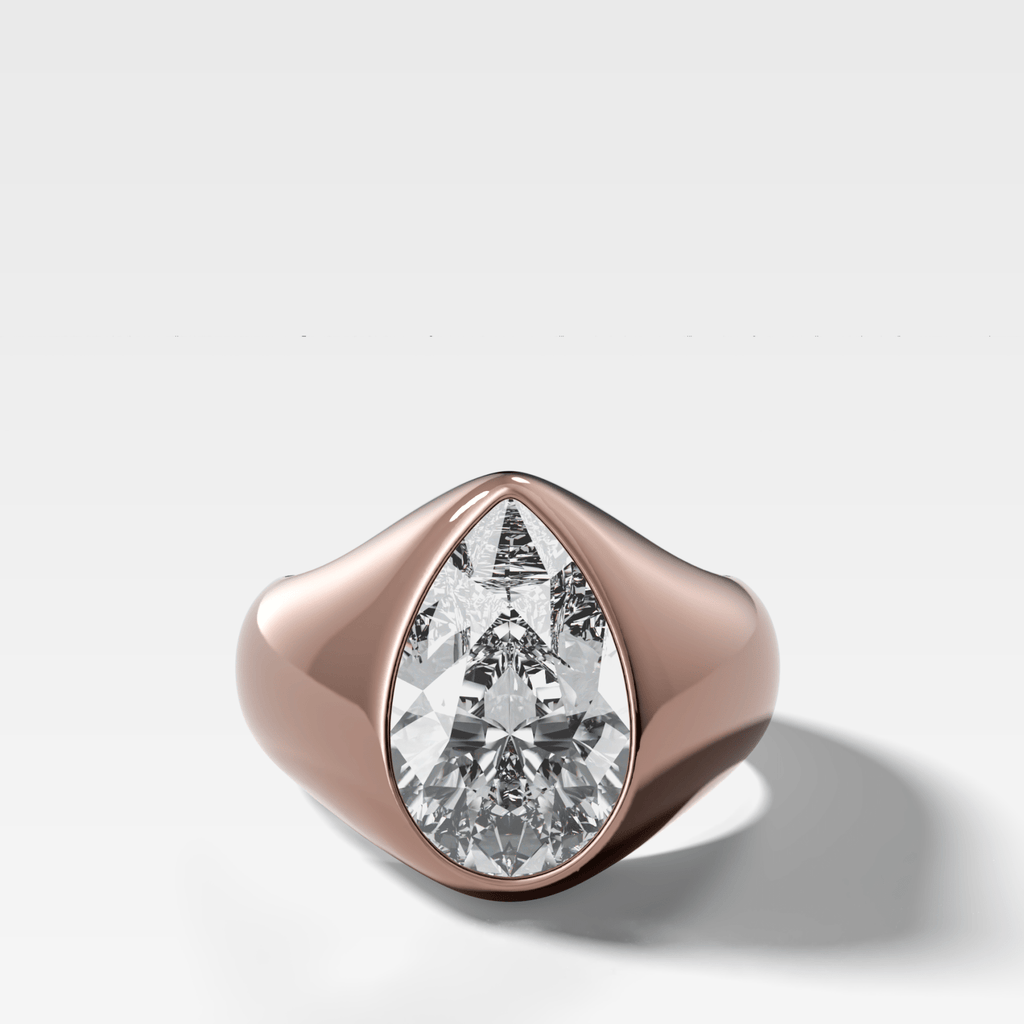 Sculptural Engagement Ring with a Pear Cut Diamond