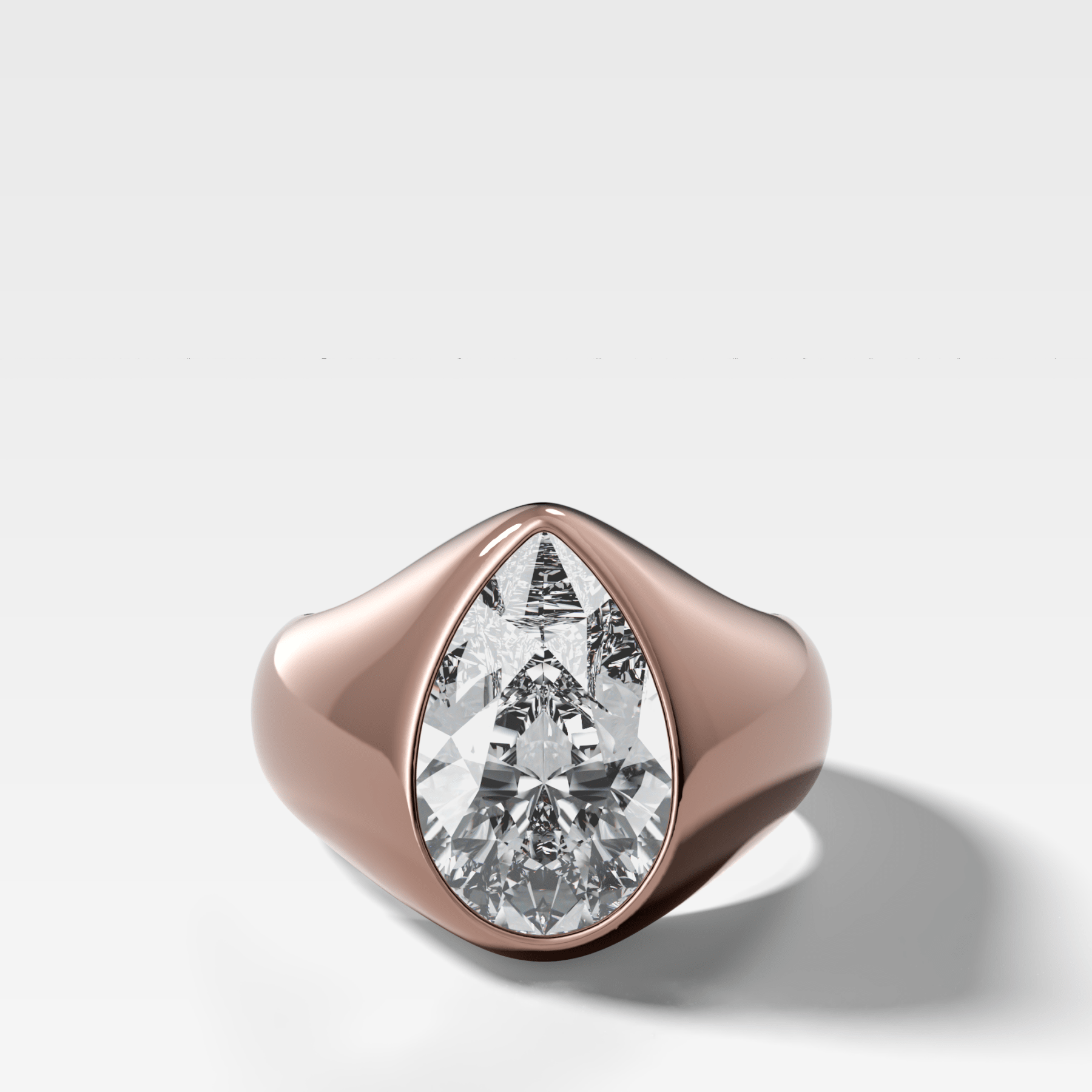 Sculptural Engagement Ring with a Pear Cut Diamond