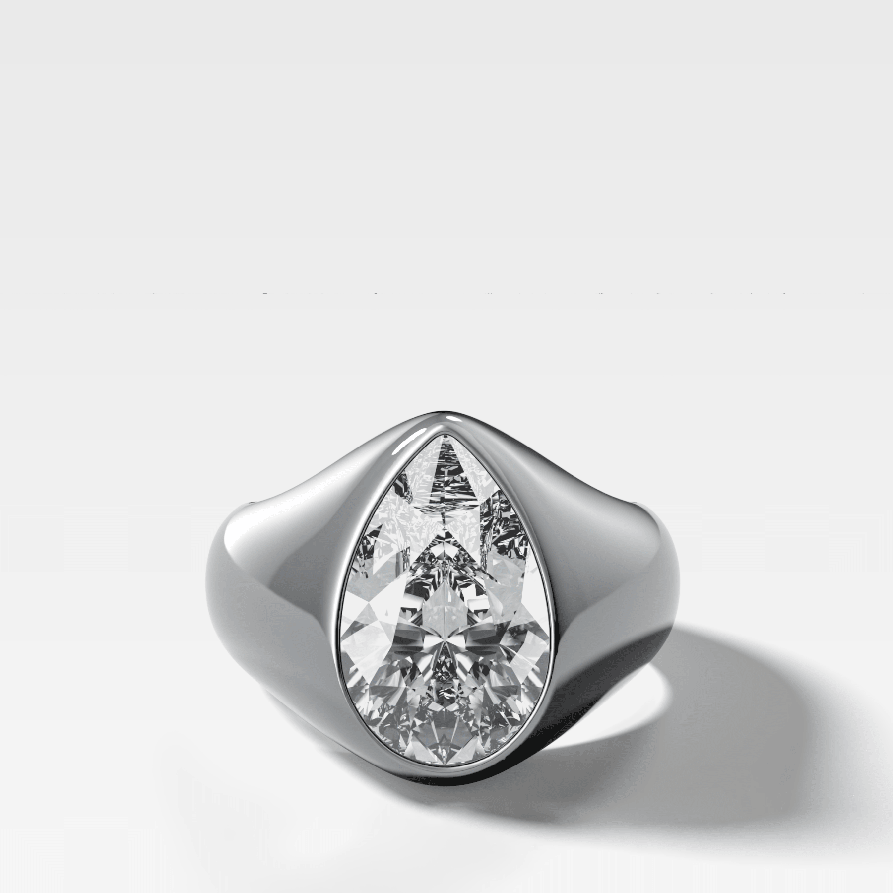 Sculptural Engagement Ring with a Pear Cut Diamond
