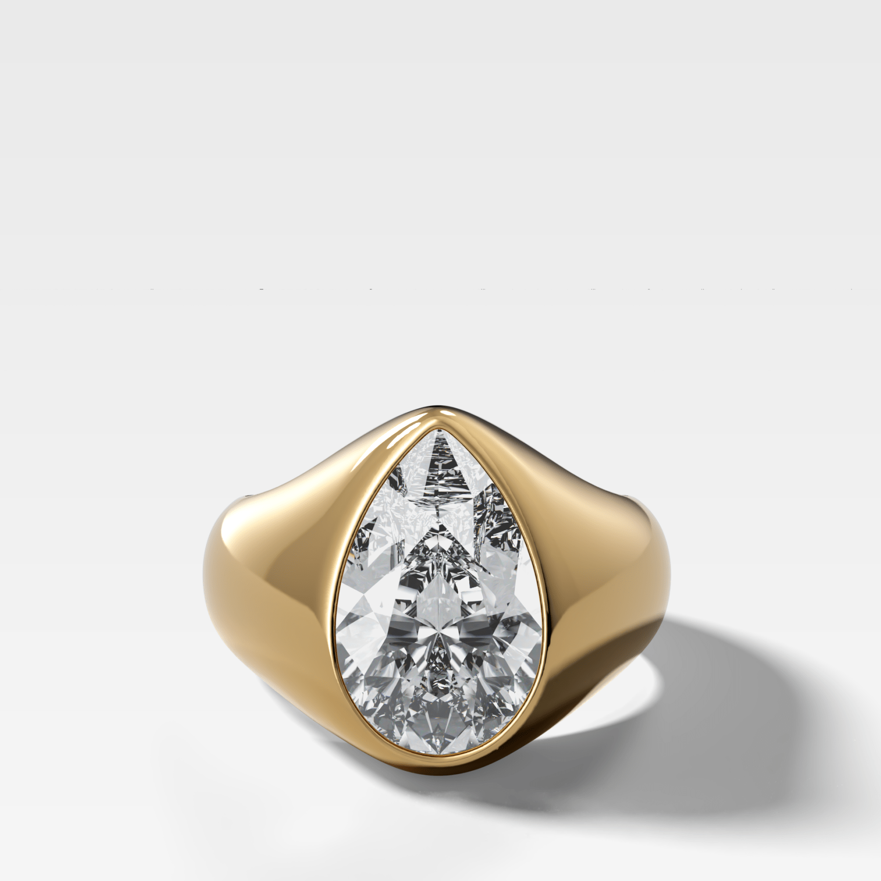 Sculptural Engagement Ring with a Pear Cut Diamond