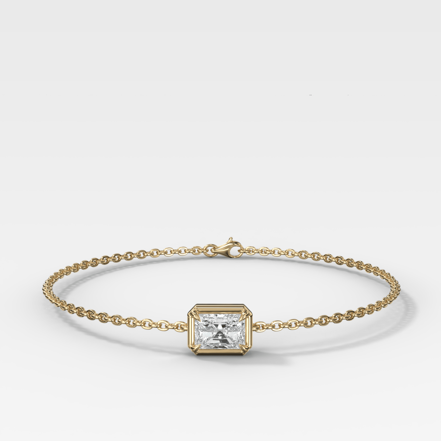 Single Stone Bezel Bracelet with East West Elongated Radiant Cut Diamond