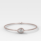 Single Stone Bezel Bracelet with East West Pear Cut Diamond