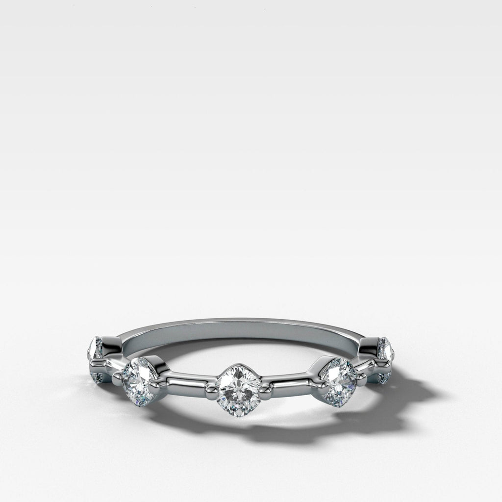 Spaced Compass Wedding Band with Five Cushion Cuts