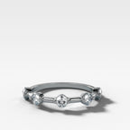 Spaced Compass Wedding Band with Five Cushion Cuts