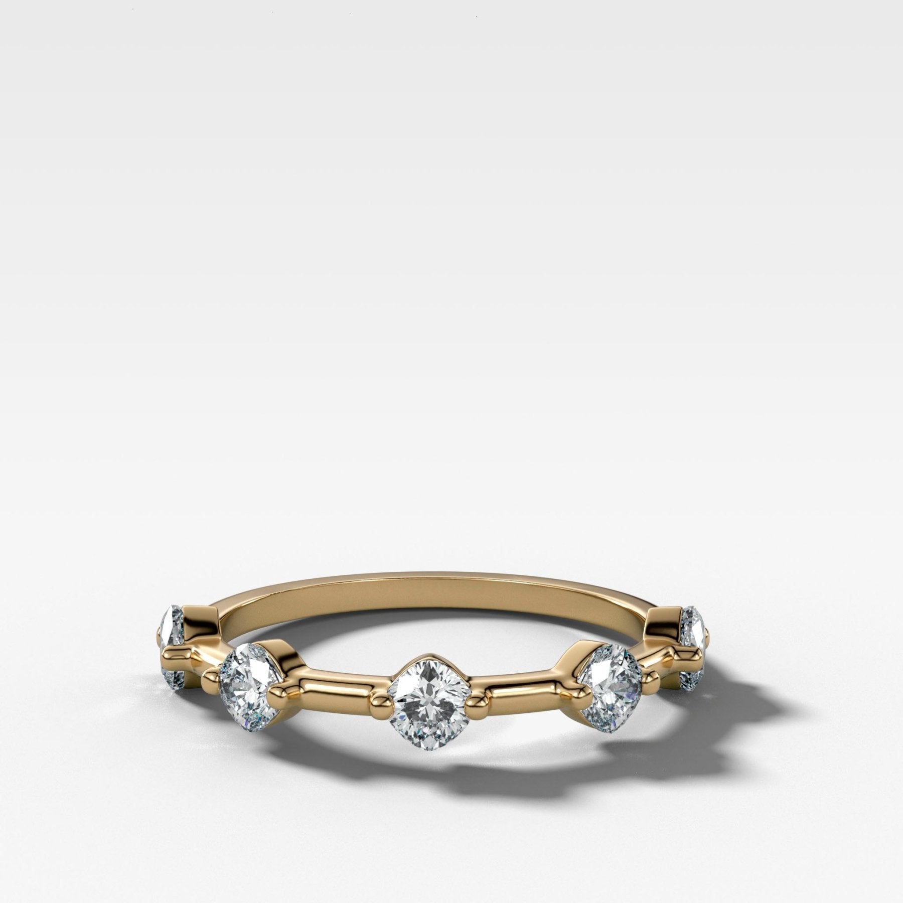 Spaced Compass Wedding Band with Five Cushion Cuts