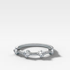 Spaced Compass Wedding Band with Four Cushion Cuts