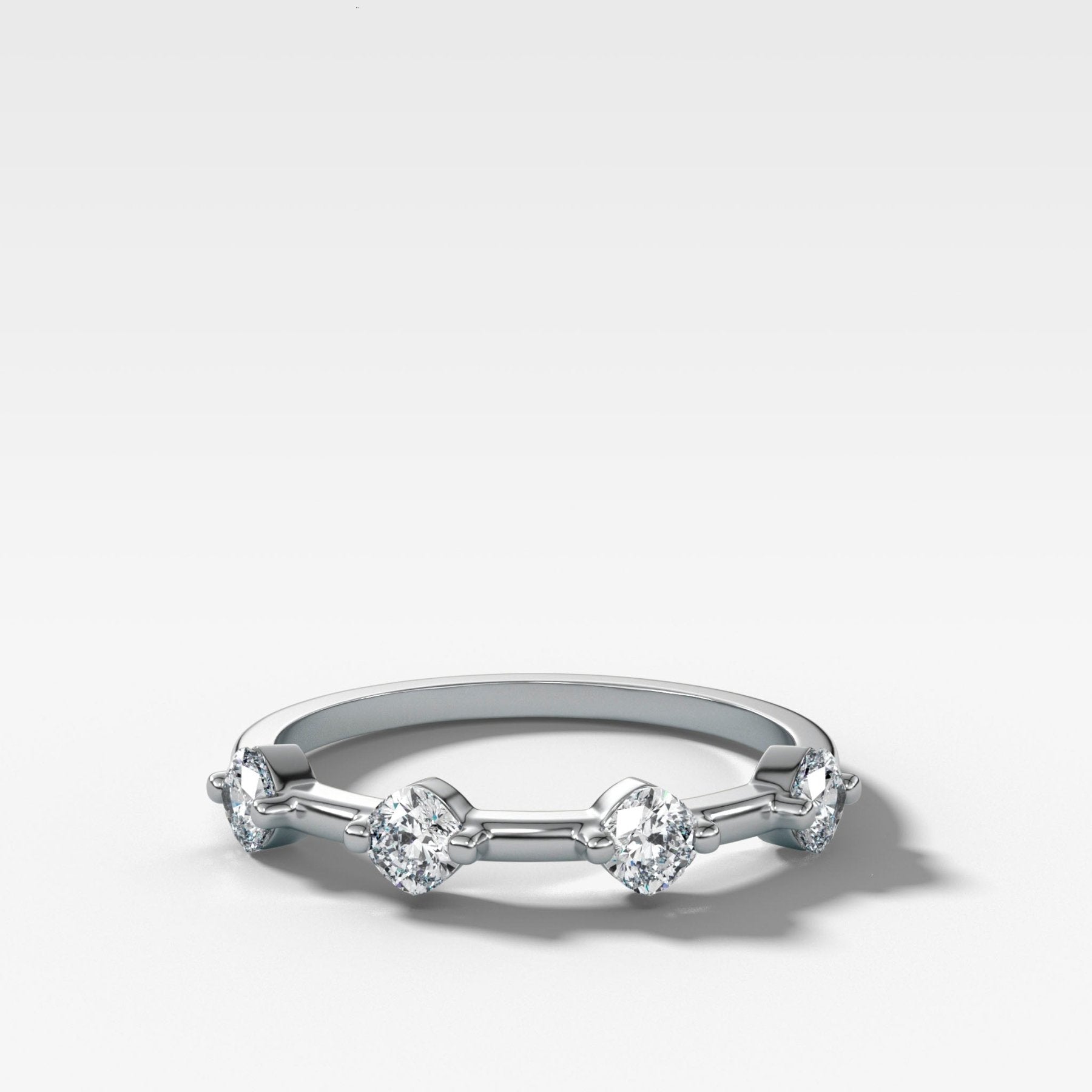 Spaced Compass Wedding Band with Four Cushion Cuts