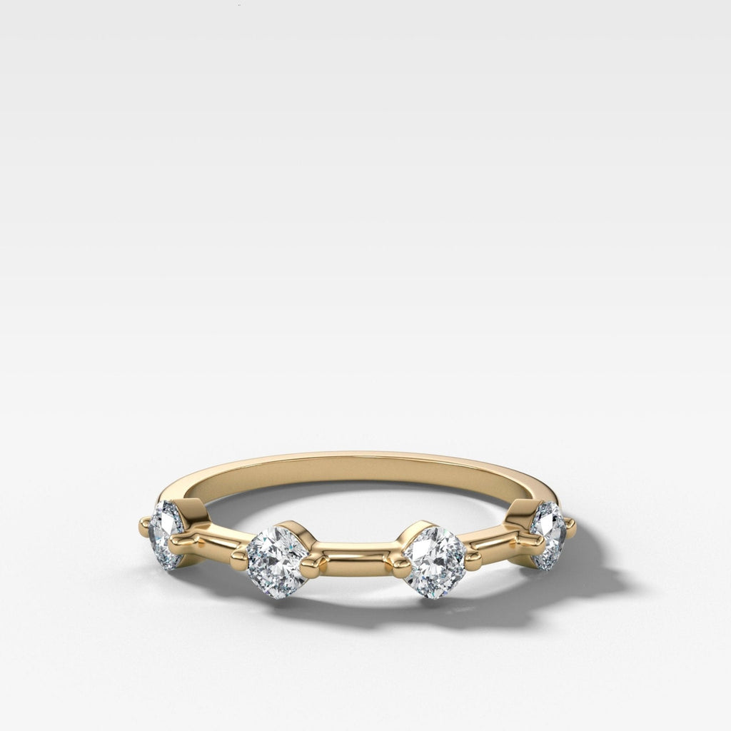Spaced Compass Wedding Band with Four Cushion Cuts