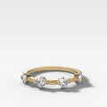 Spaced Compass Wedding Band with Four Cushion Cuts