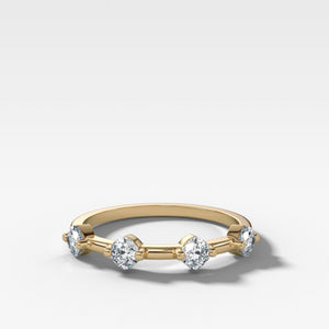 Spaced Compass Wedding Band with Four Cushion Cuts