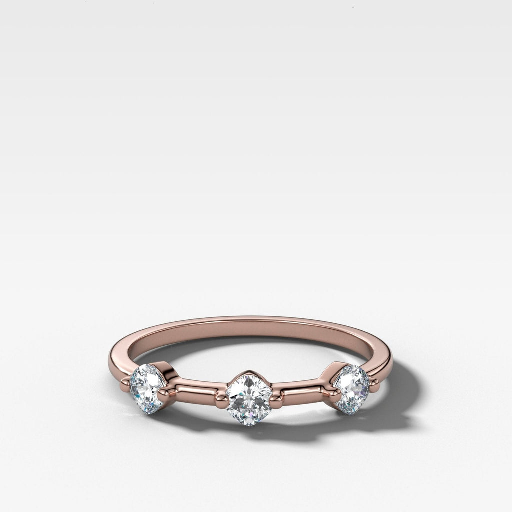 Spaced Compass Wedding Band with Three Cushion Cuts