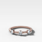 Spaced Compass Wedding Band with Three Cushion Cuts