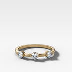 Spaced Compass Wedding Band with Three Cushion Cuts