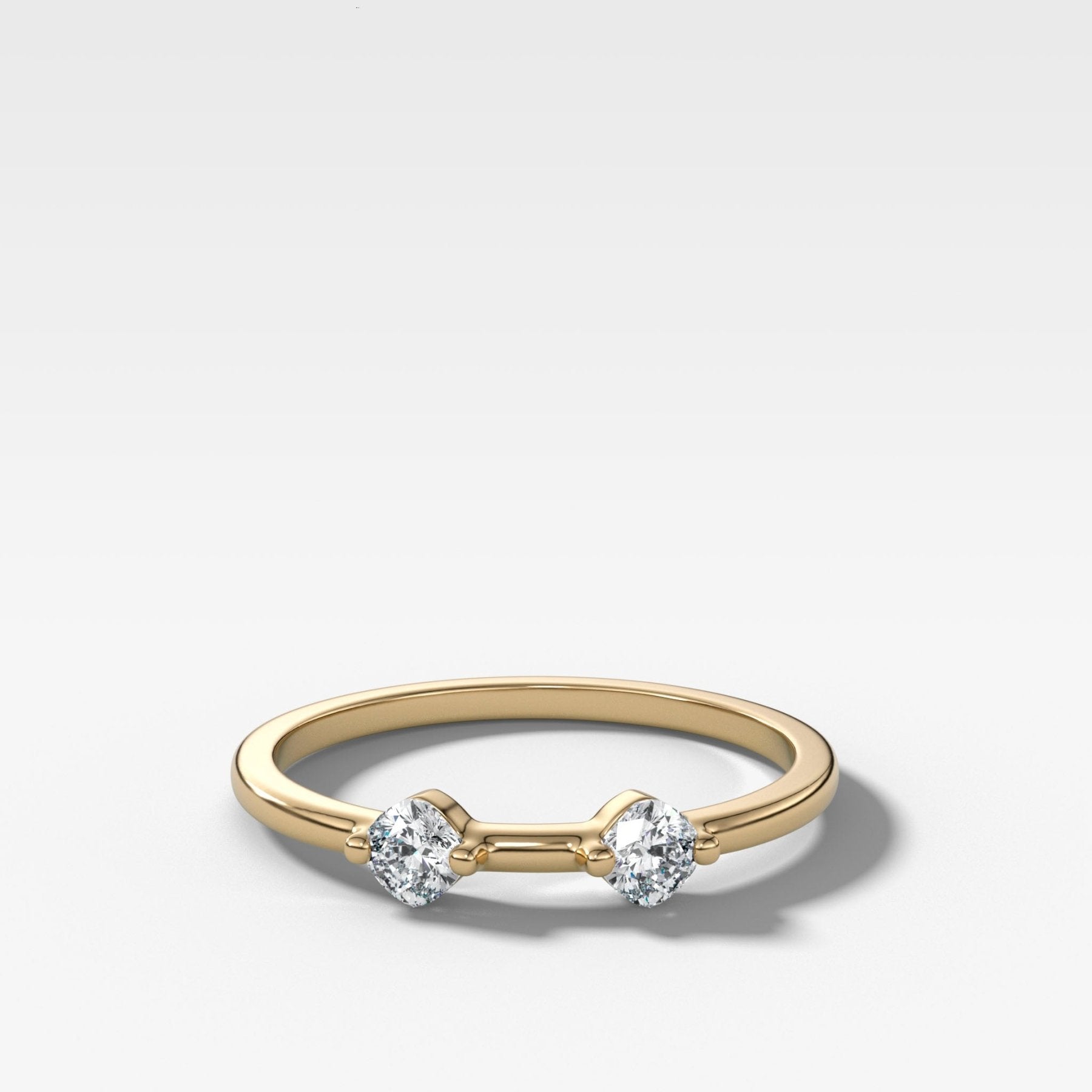 Spaced Compass Wedding Band with Two Cushion Cuts Main image
