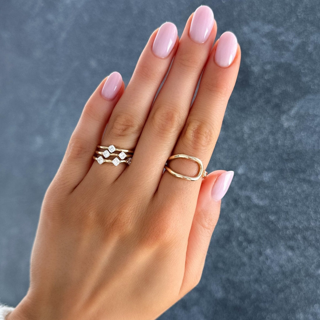 Spaced Compass Wedding Band with Two Cushion Cuts