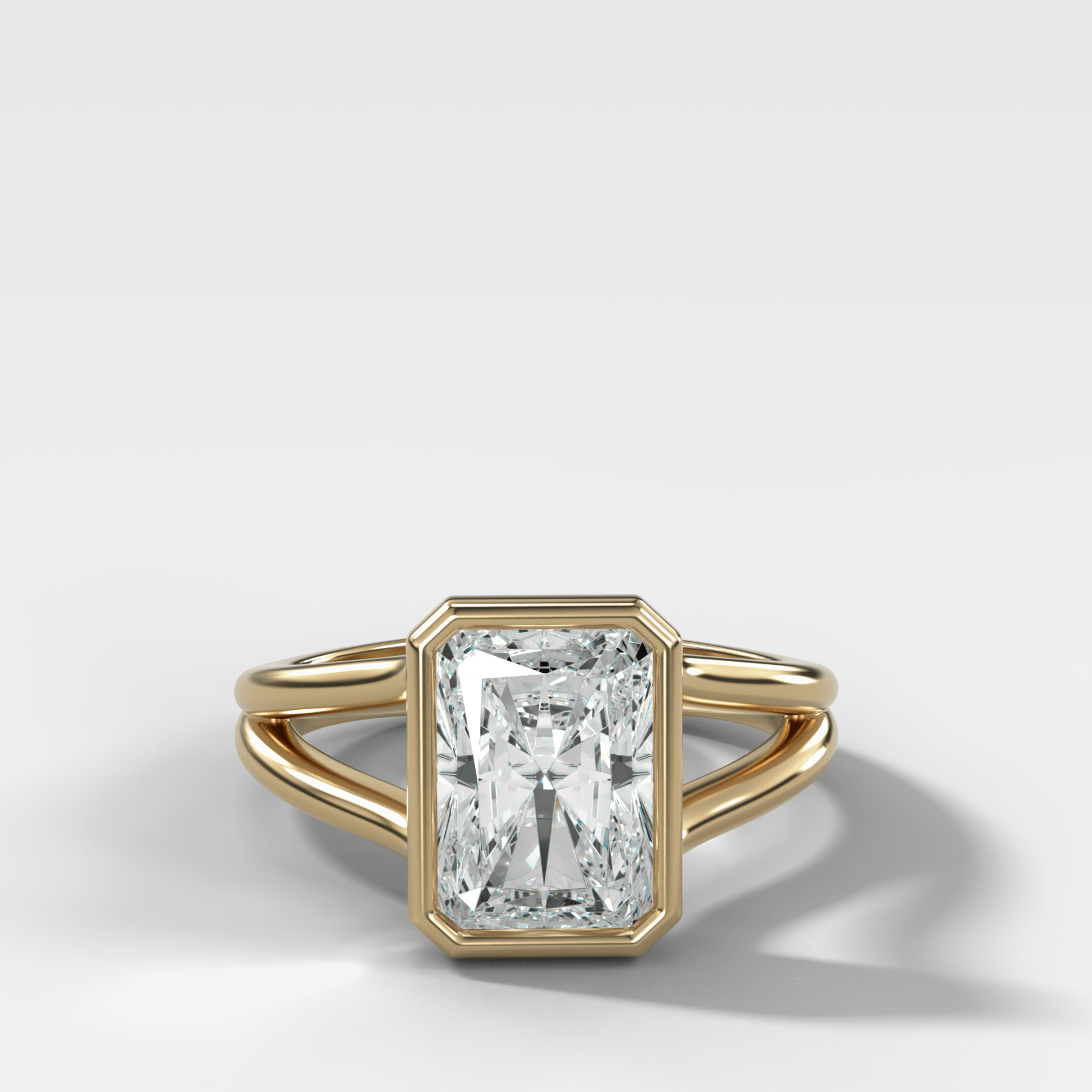 Split Shank Bezel Engagement Ring with Elongated Radiant Cut Diamond