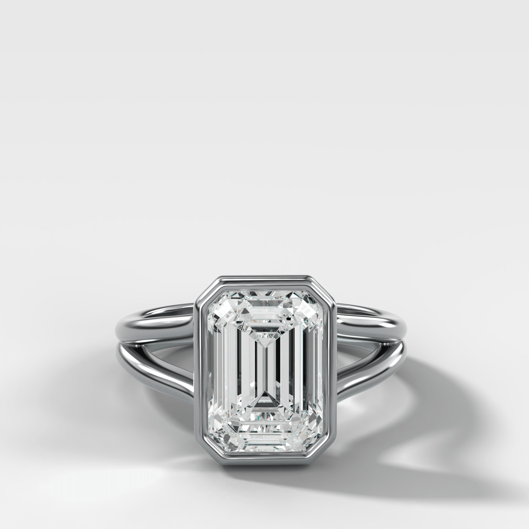 Split Shank Bezel Engagement Ring with Emerald Cut Diamond