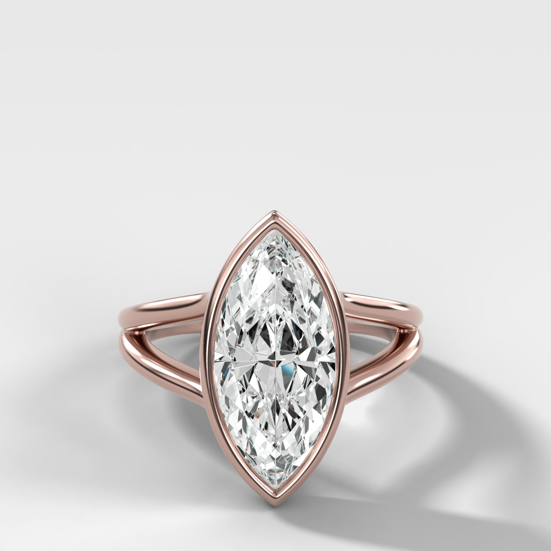 Split Shank Bezel Engagement Ring with Marquise Cut Diamond
