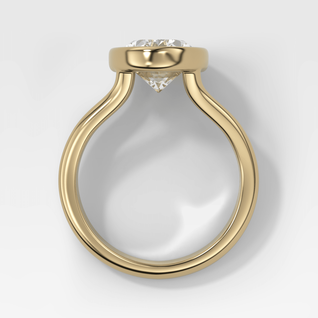 Split Shank Bezel Engagement Ring with Oval Cut Diamond