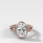 Split Shank Bezel Engagement Ring with Oval Cut Diamond