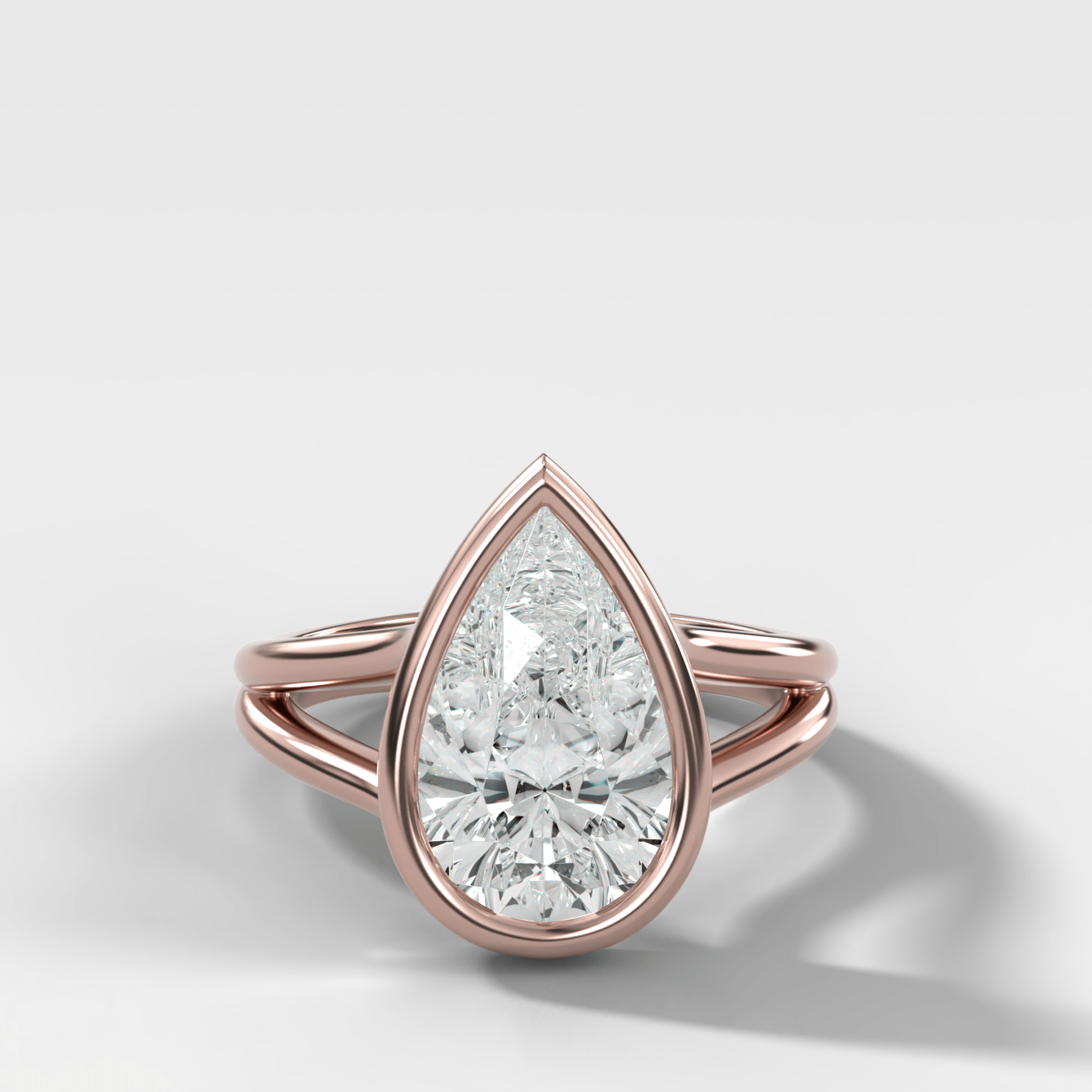 Split Shank Bezel Engagement Ring with Pear Cut Diamond