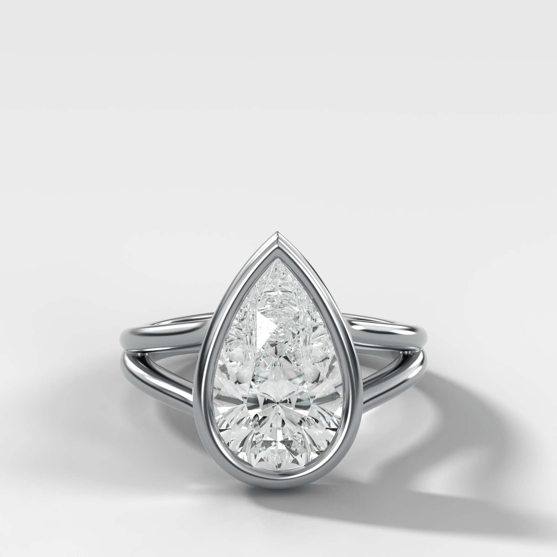 Split Shank Bezel Engagement Ring with Pear Cut Diamond