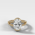 Split Shank Half Bezel Engagement Ring with Oval Cut Diamond