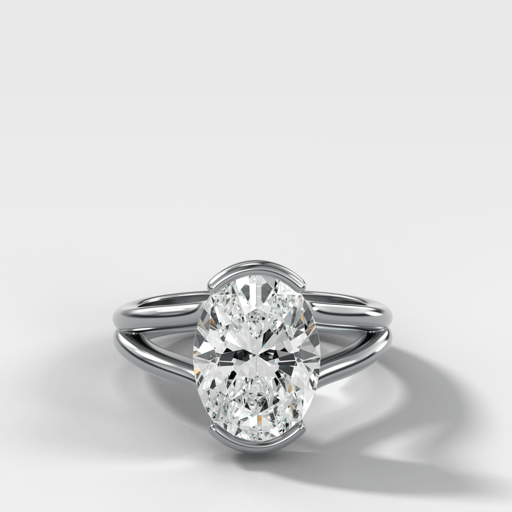 Split Shank Half Bezel Engagement Ring with Oval Cut Diamond