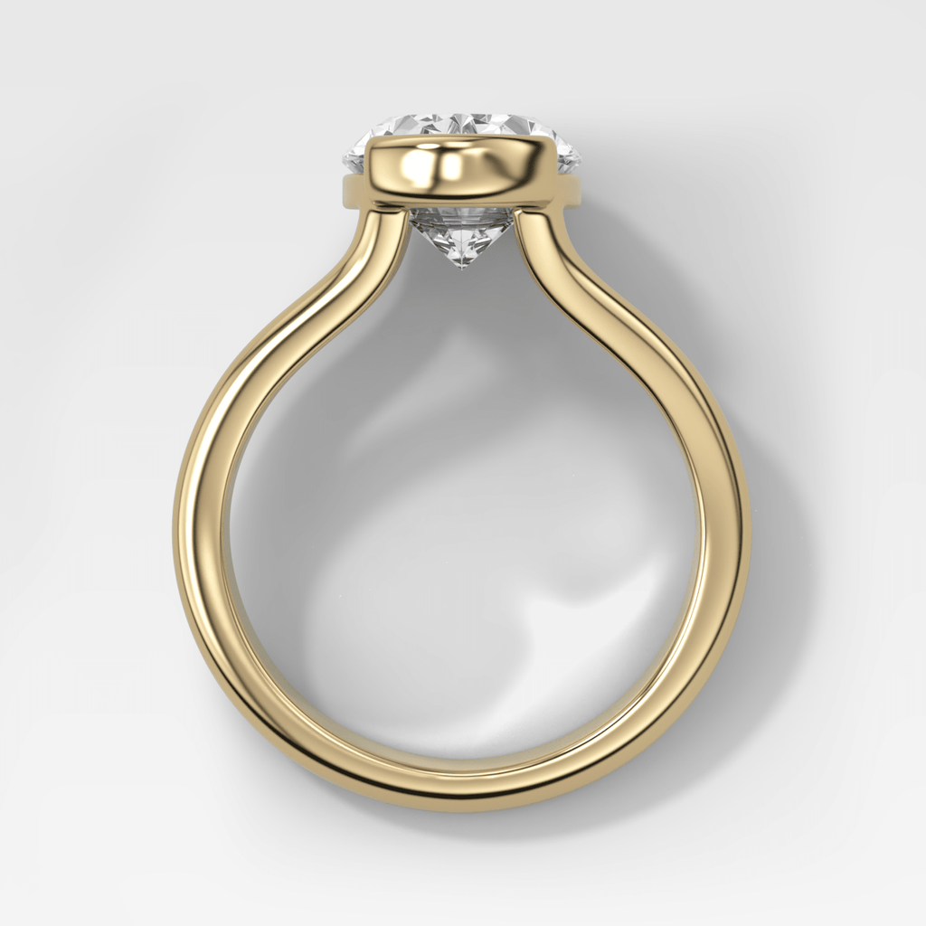 Split Shank Half Bezel Engagement Ring with Oval Cut Diamond