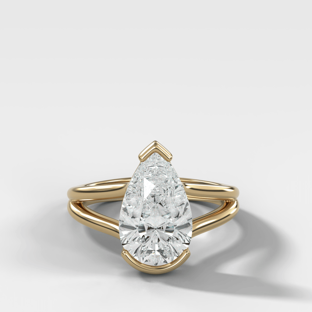 Split Shank Half Bezel Engagement Ring with Pear Cut Diamond
