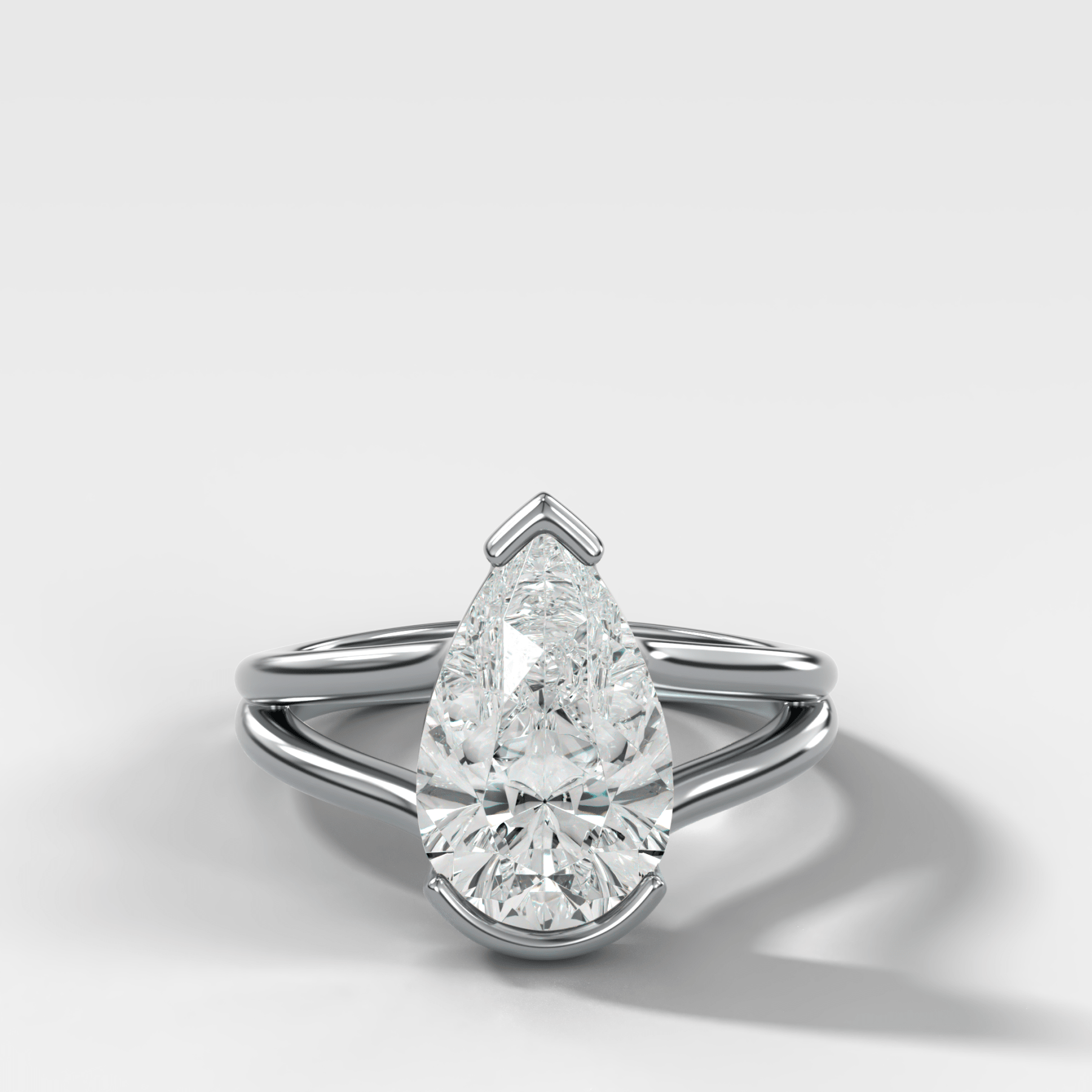Split Shank Half Bezel Engagement Ring with Pear Cut Diamond