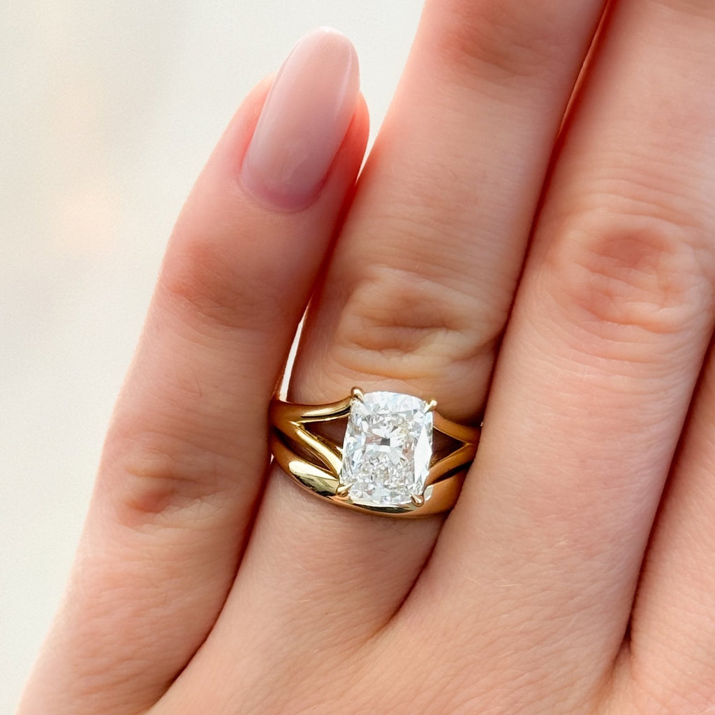 Split Shank Solitaire Engagement Ring with Elongated Cushion Cut Diamond