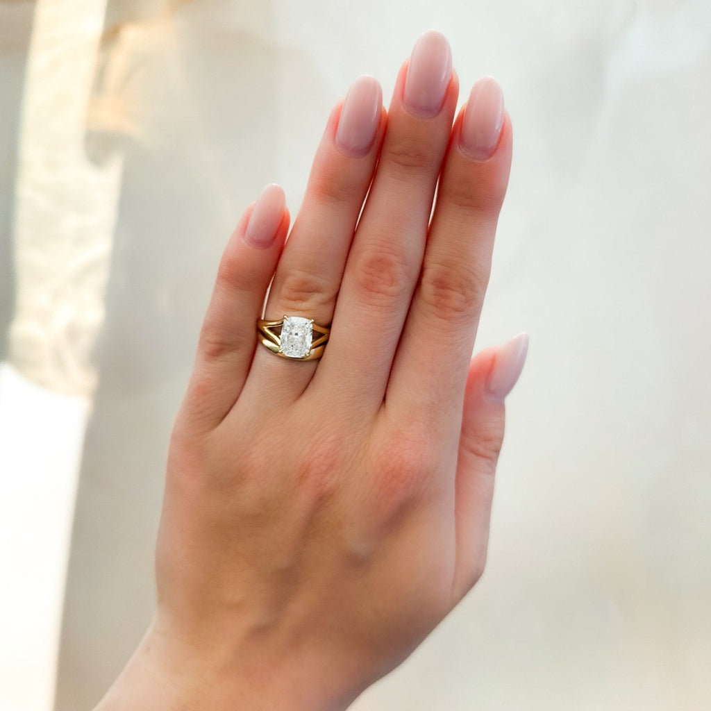 Split Shank Solitaire Engagement Ring with Elongated Cushion Cut Diamond