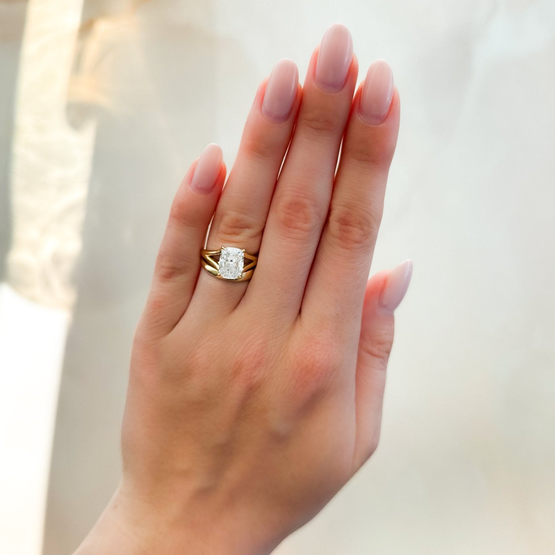 Split Shank Solitaire Engagement Ring with Elongated Cushion Cut Diamond