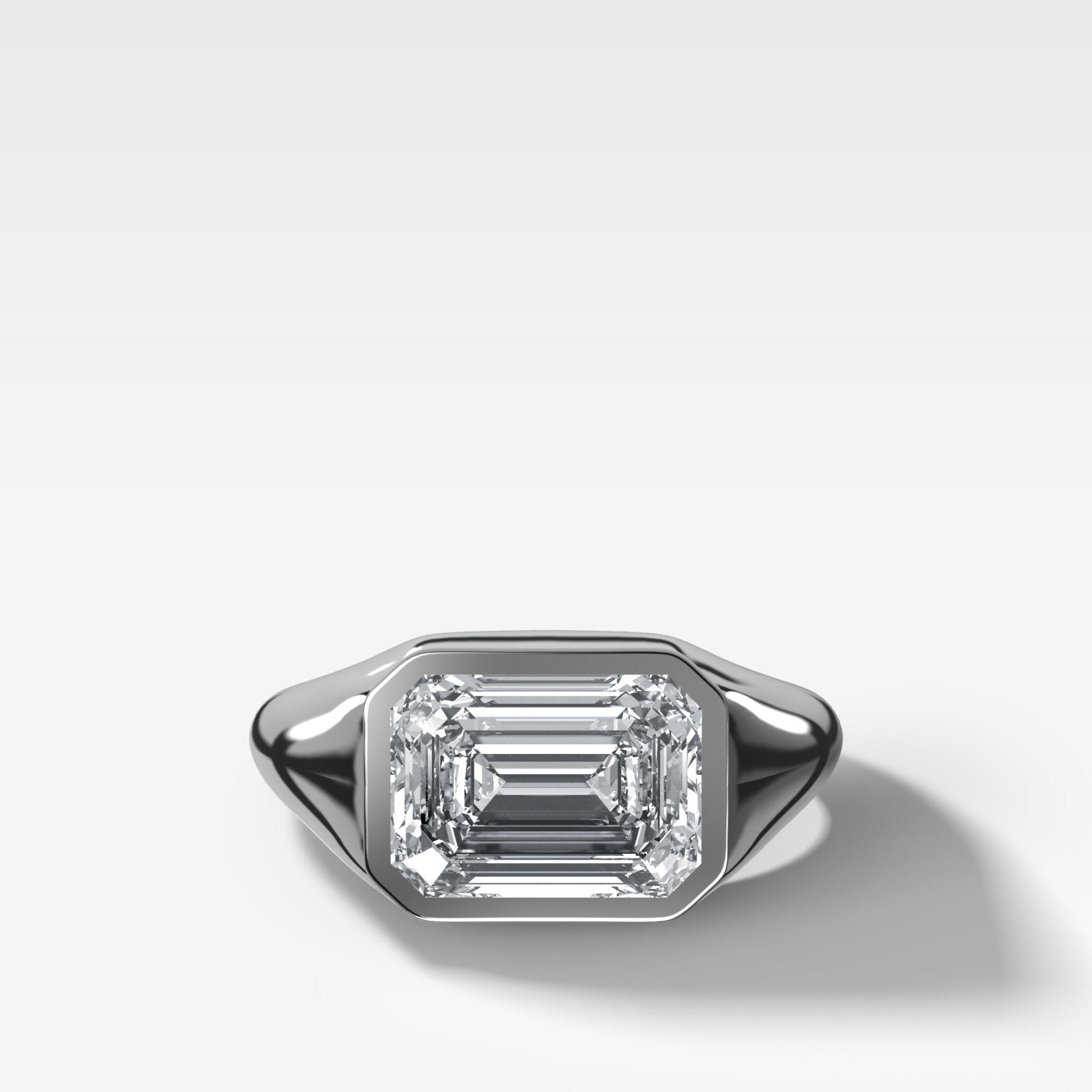 Tapered Bezel Signet Engagement Ring with East West Emerald Cut Diamond