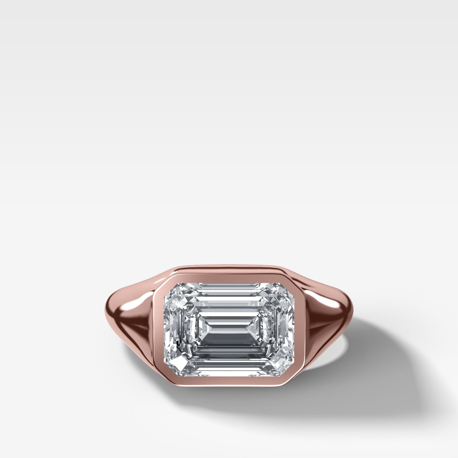 Tapered Bezel Signet Engagement Ring with East West Emerald Cut Diamond