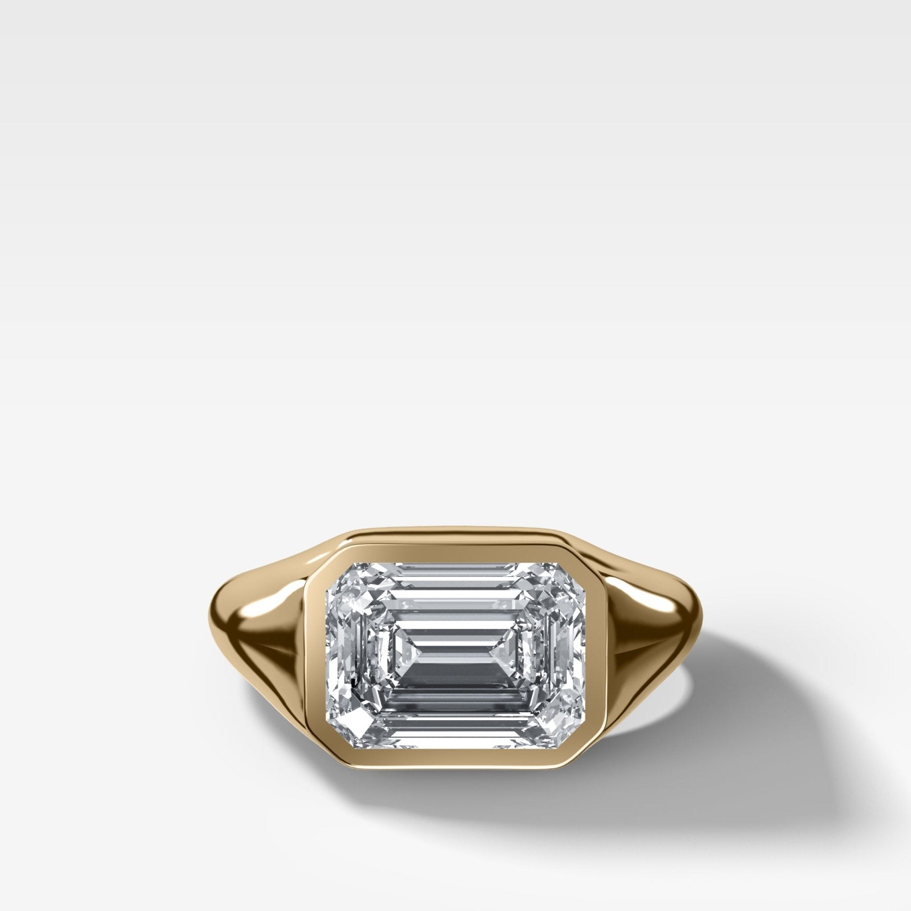 Tapered Bezel Signet Engagement Ring with East West Emerald Cut Diamond