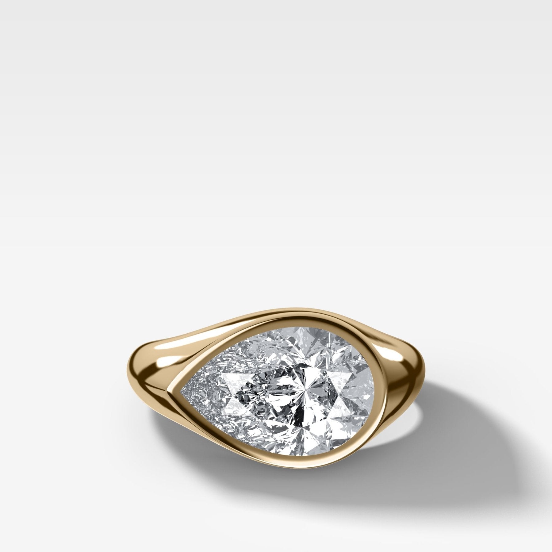 Tapered Bezel Signet Engagement Ring with East West Pear Cut Diamond